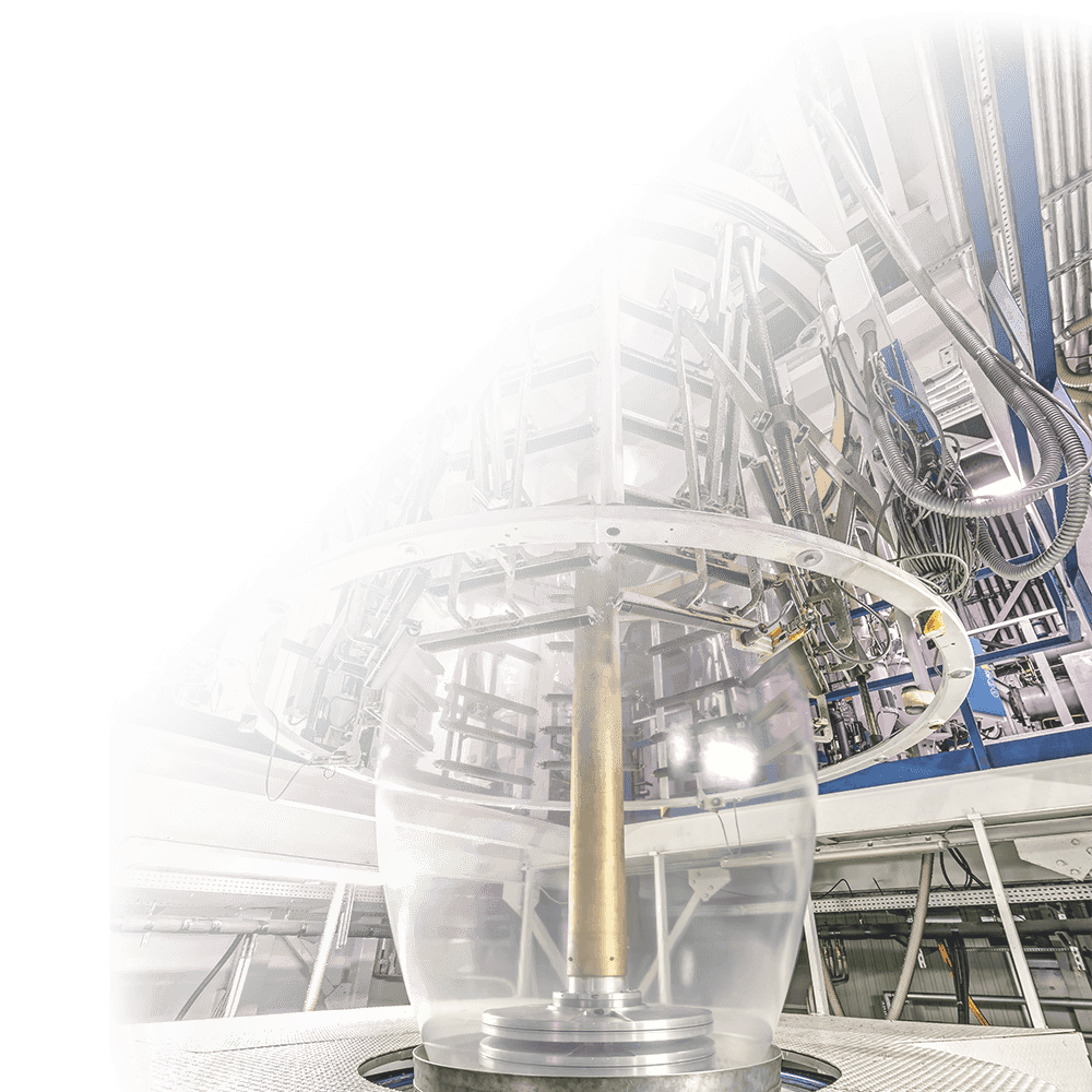 Photo of a blown extrusion machine extruding clear VCI film.